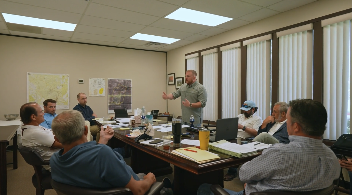 The Rise Capital Group team in a meeting